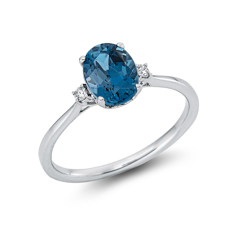 Ring 18 kt WG, 2 Brill. 0,04 ct, TW-si, 1 Topas 1,37 ct Lond. blue
