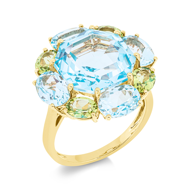 Ring 18 kt GG, 4 Topase 3,80 ct sky blue, 1 Topas 9,80 ct sky blue, 4 Peridot 1,60 ct grün
