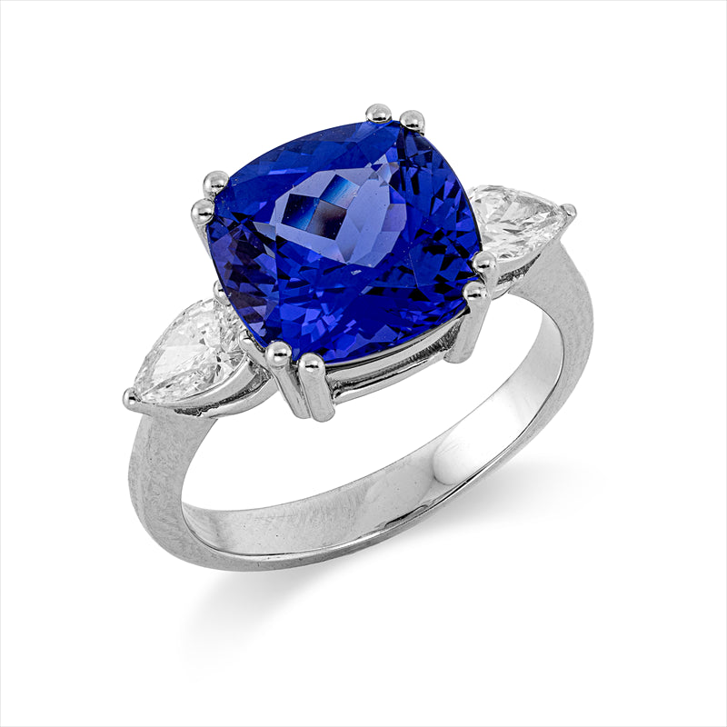 Ring 18 kt WG, 2 Tropfen 0,56 ct, F-si, 1 Tansanit 4,65 ct blau