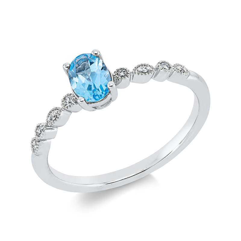Ring 18 kt WG, 8 Brill. 0,03 ct, TW-si, 1 Topas 0,60 ct blau