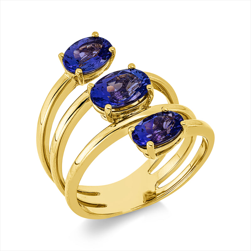 Ring 18 kt GG, 1 Tansanit 1,35 ct blau, 2 Tansanit 1,76 ct blau