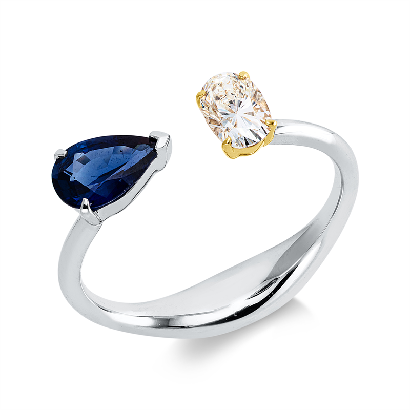 Ring 18 kt WG+GG, 1 Oval 0,36 ct, W-si, 1 Saphir 0,55 ct blau