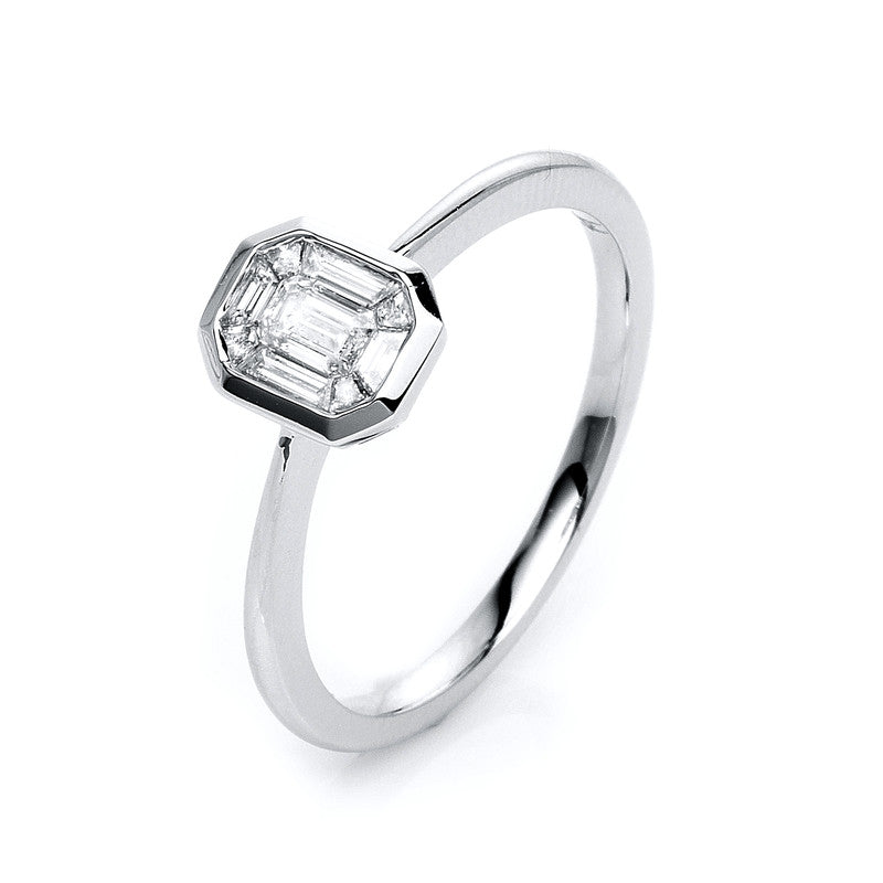 Ring 18 kt WG, 1 Sm.schliff 0,16 ct, TW-si, 8 Trap. 0,16 ct, TW-si