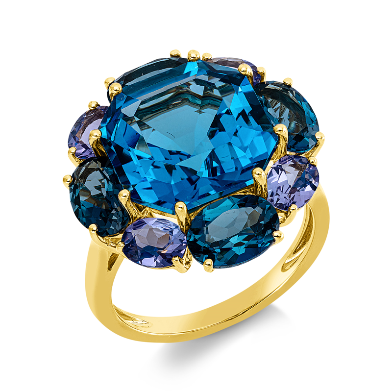Ring 18 kt GG, 4 Topase 3,80 ct Lond. blue, 1 Topas 9,80 ct blau, 4 Tansanit 1,60 ct blau