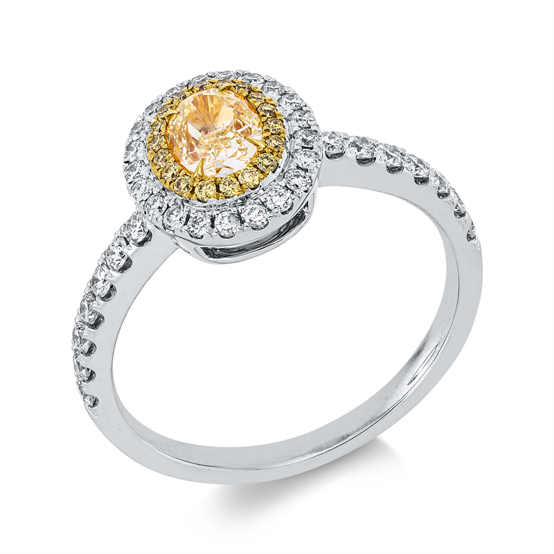 Ring 18 kt WG+GG, 1 Oval 0,56 ct, gelb, 18 Brill. 0,14 ct, gelb, 35 Brill. 0,26 ct, TW-si