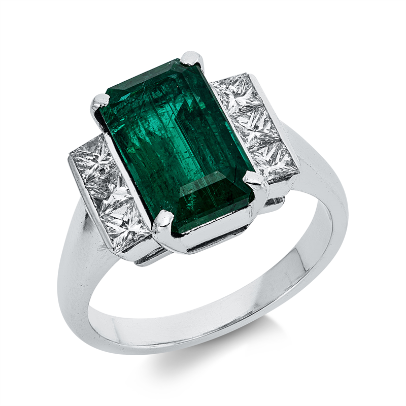 Ring 18 kt WG, 6 Princ. 0,68 ct, TW-si, 1 Smaragd 3,83 ct grün