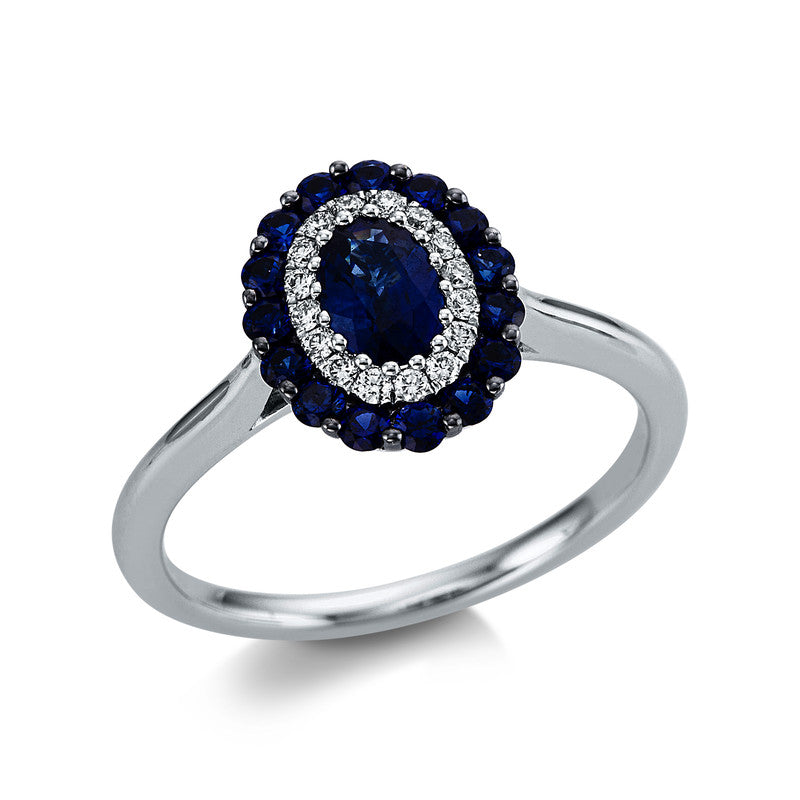 Ring 18 kt WG, 16 Brill. 0,11 ct, TW-si, 1 Saphir 0,54 ct blau, 15 Saphire 0,39 ct blau