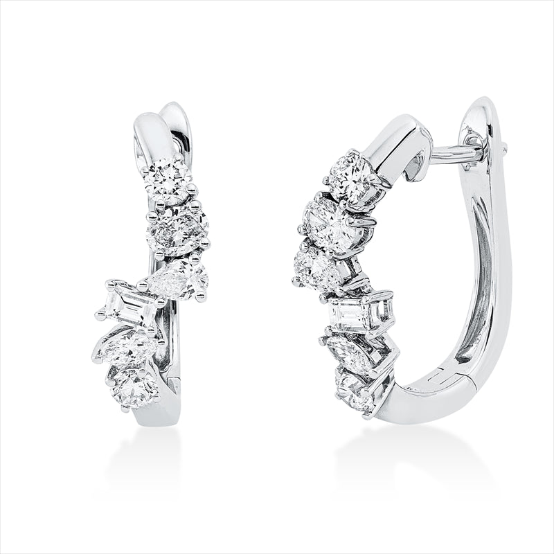 Creolen 18 kt WG, 2 Tropf. 0,14 ct,2 Oval 0,19 ct,2 Nav. 0,10 ct, 2 Bag. 0,13 ct, 4 Brill. 0,29 ct, TW-si