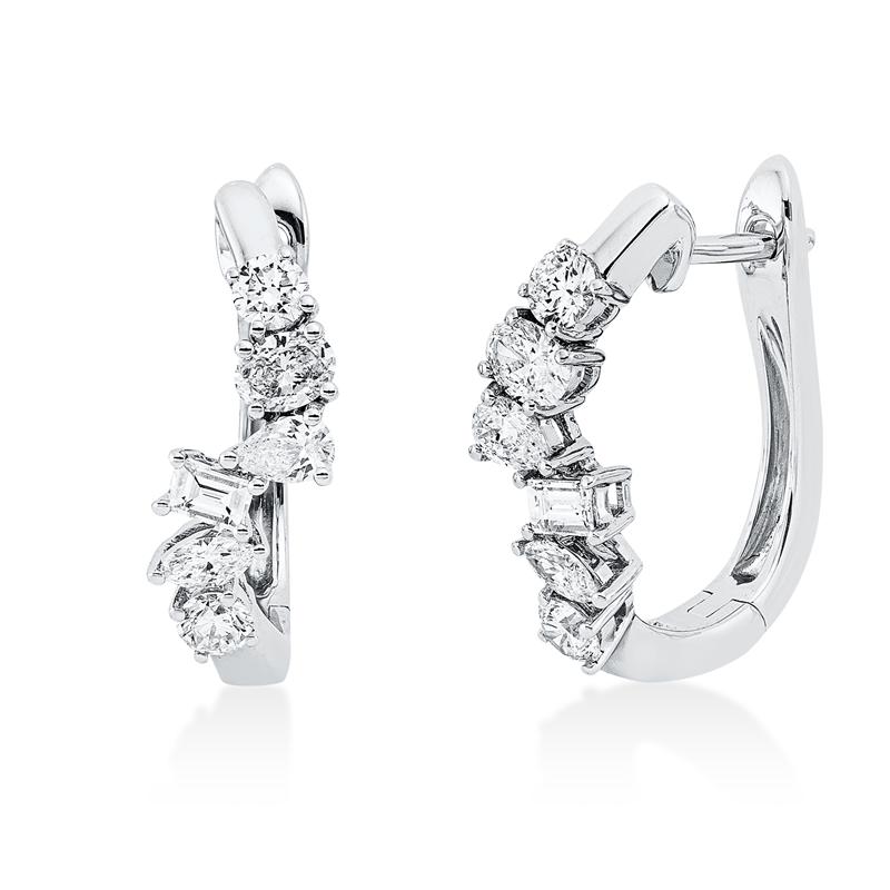 Creolen 18 kt WG, 2 Tropfen 0,14 ct, 2 Oval 0,19 ct, 2 Nav. 0,10 ct, 2 Bag.0,13ct,4 Brill.0,29ct, TW-si