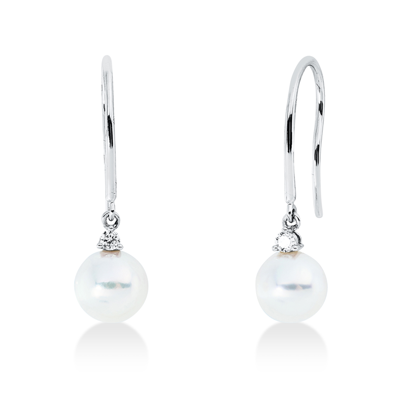 Ohrschmuck 18 kt WG, 2 Brill. 0,07 ct, TW-si, 2 ZP weiß 7,2 mm