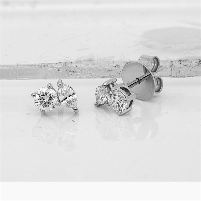 Ohrstecker 18 kt WG, 2 Nav. 0,25 ct, TW-si, 2 Brill. 0,47 ct, TW-si