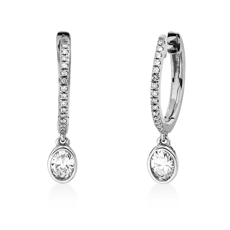 Ohrschmuck 18 kt WG, 32 Brill. 0,09 ct, TW-si, 2 Oval 0,40 ct, TW-si