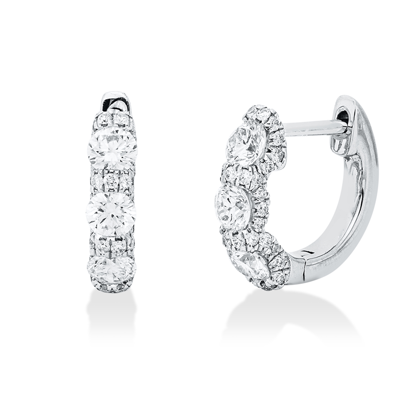 Creolen 18 kt WG, 6 Brill. 0,58 ct, TW-si, 70 Brill. 0,27 ct, TW-si
