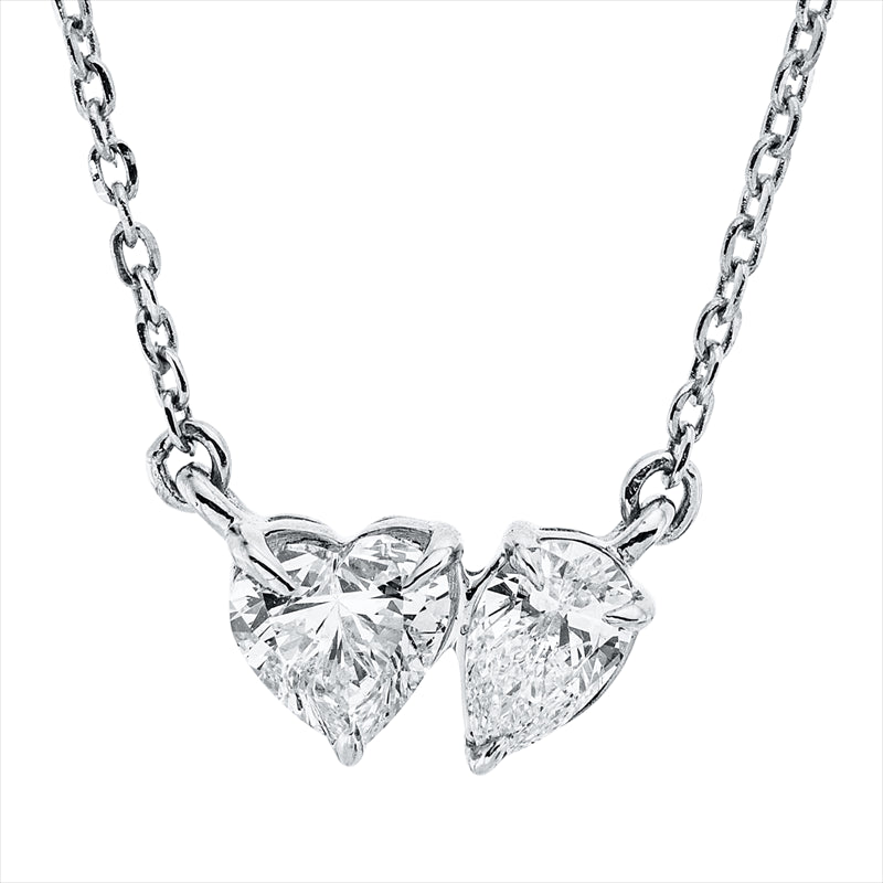 Collier 18 kt WG, mit ZÖ 40 cm + 43 cm, 1 Herzschl. 0,24 ct, TW-si, 1 Tropfen 0,14 ct, TW-si
