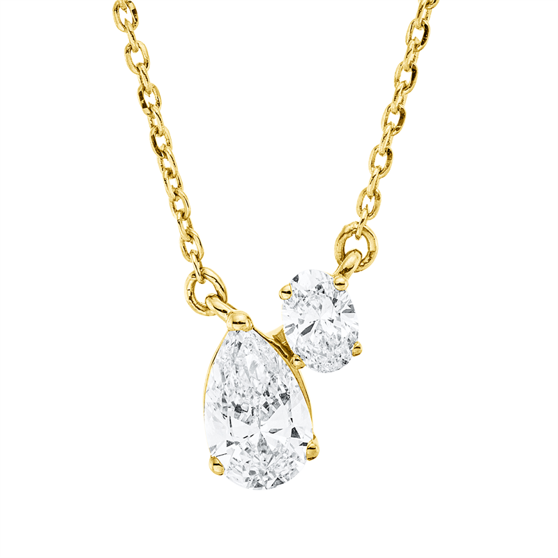 Collier 18 kt GG, mit ZÖ 40 cm + 43 cm, 1 Oval 0,08 ct, TW-si, 1 Tropfen 0,31 ct, TW-si