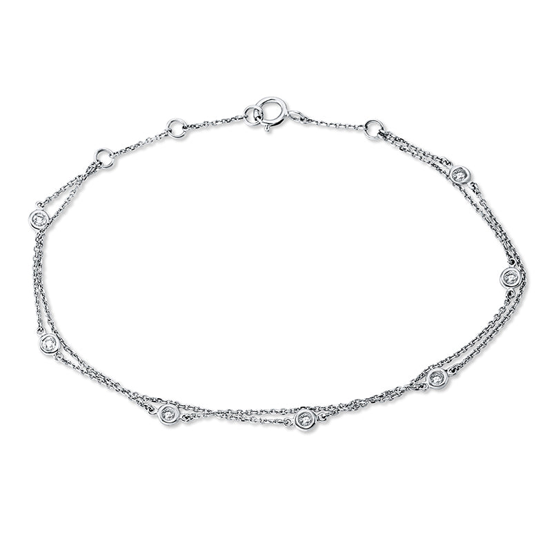 Armband 18 kt WG, 7 Brill. 0,19 ct, W-si