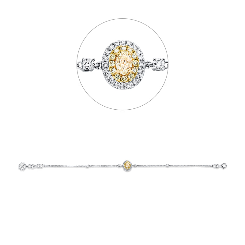 Armband 18 kt WG+GG, 1 Oval 0,31 ct, i12 Brill. 0,11 ct, gelb, 20 Brill. 0,12 ct, 4 Brill. 0,20 ct, TW-si,