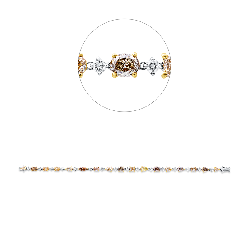 Armband 18 kt GG+WG, 17 Brill. 1,31 ct, TW-pi, 17 Fant-Schl. 7,83 ct, fancy