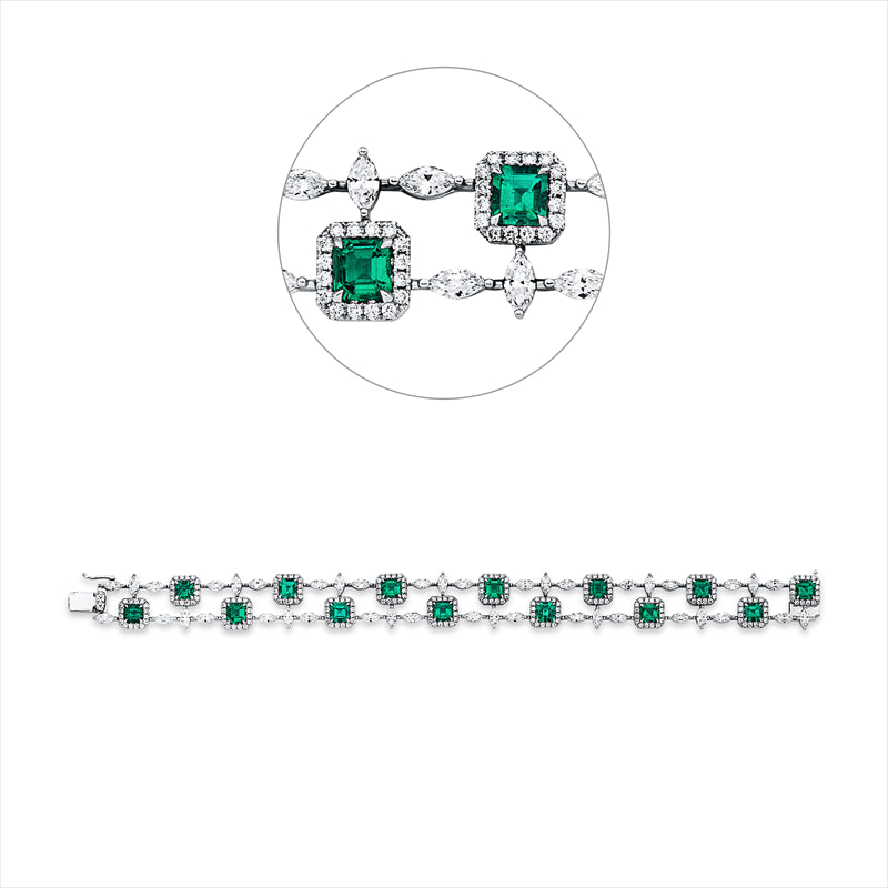 Armband 18 kt WG, 42 Nav. 3,85 ct, TW-vsi, 224 Brill. 1,37 ct, TW-vsi, 14 Smaragde 5,40 ct grün