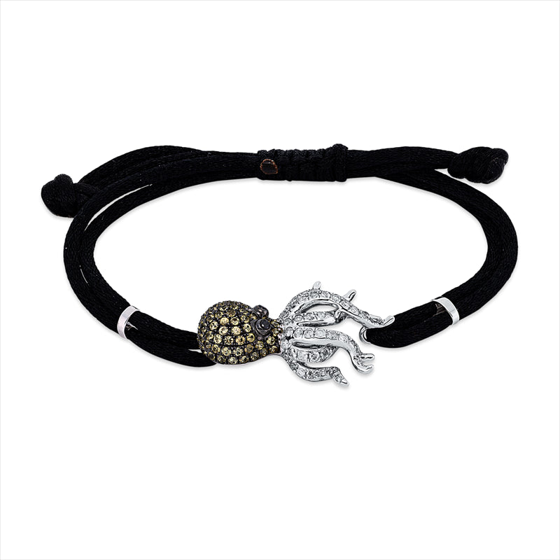Armband 18 kt WG, schwarzes cord, 8 Brill. 0,09 ct, I-pi, 79 Brill. 0,85 ct, schwarz