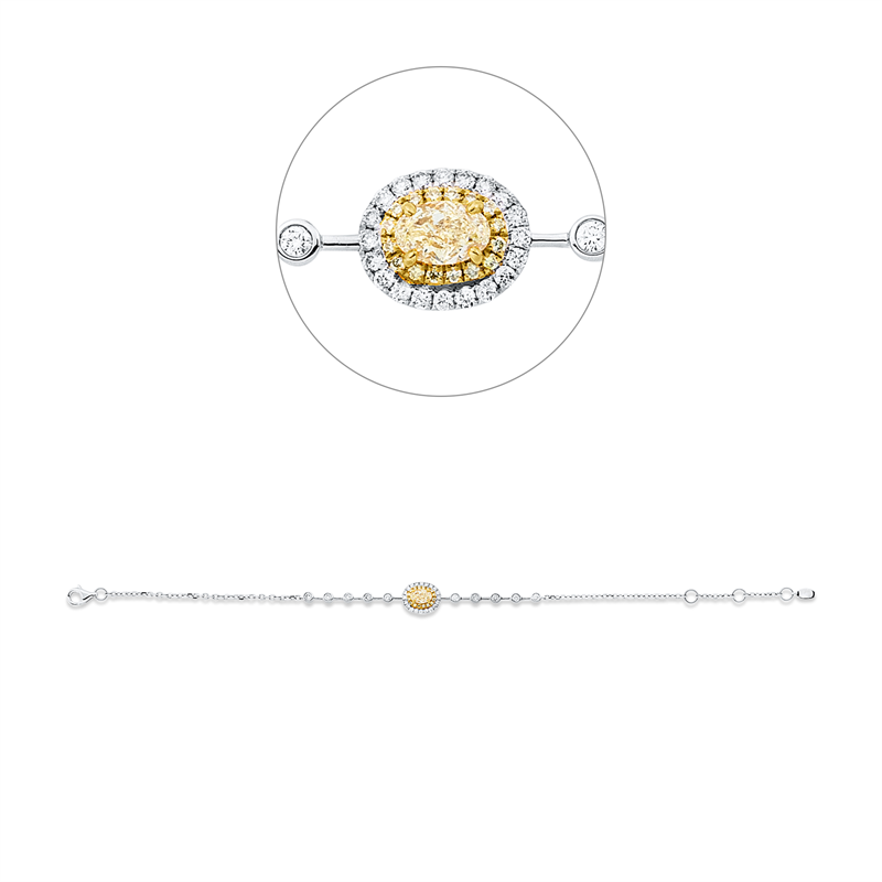 Armband 18 kt WG+GG, 20 Brill. 0,13 ct, TW-si, 1 Oval 0,36 ct, gelb, 16 Brill. 0,06 ct, gelb