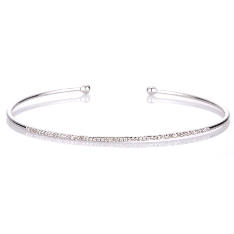 Armreif 18 kt WG, 53 Brill. 0,16 ct, TW-vsi/si