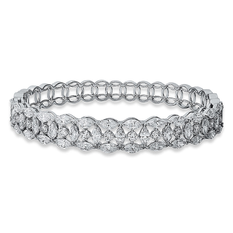 Armreif 18 kt WG, 40 Nav. 5,41 ct, TW-si, 15 Brill. 0,94 ct, TW-si