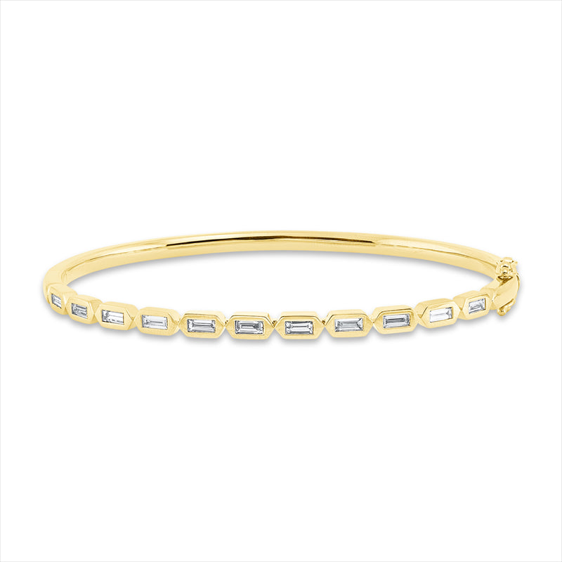 Armreif 18 kt GG, 11 Bag. 0,61 ct, TW-si