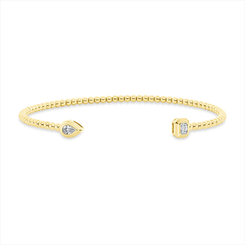 Armreif 14 kt GG, 1 Tropfen 0,10 ct, TW-pi, 1 Sm.schliff 0,10 ct, TW-pi