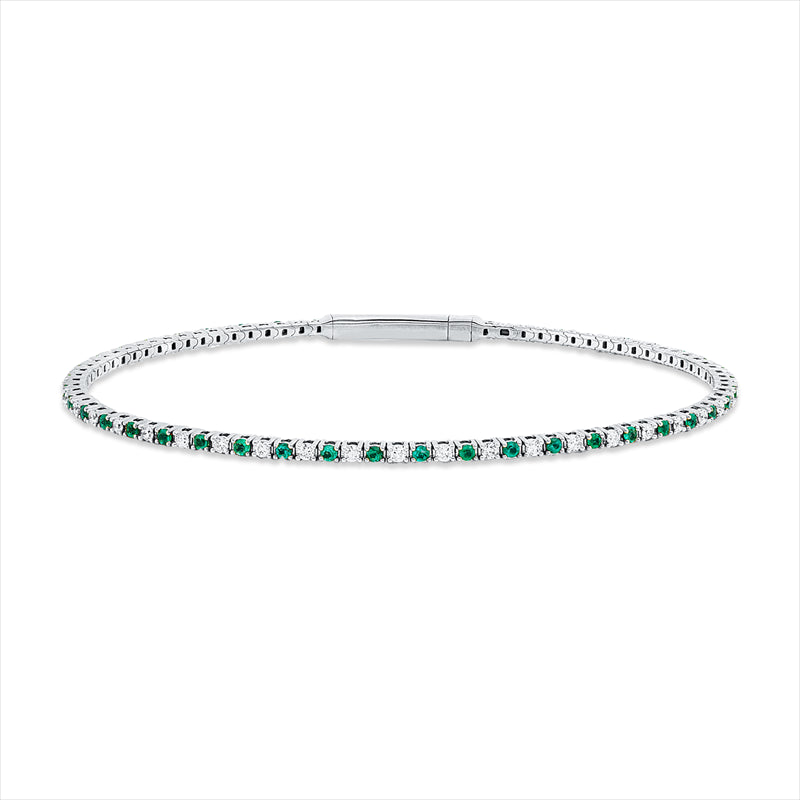 Armreif 18 kt WG, 41 Brill. 0,50 ct, TW-si, 42 Smaragde 0,59 ct grün