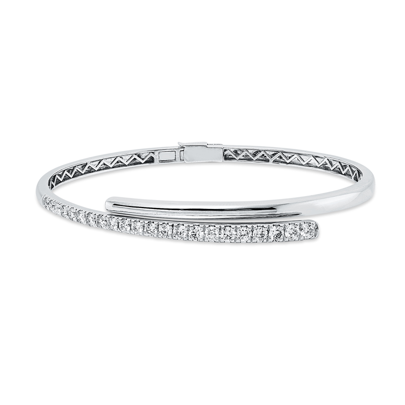 Armreif 14 kt WG, 7 Brill. 0,32 ct, 10 Brill. 0,60 ct, 3 Brill. 0,24 ct, 2 Brill. 0,08 ct, TW-pi