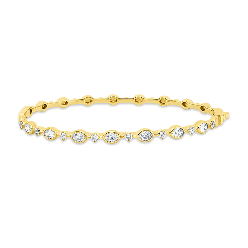 Armreif 18 kt GG, 3 Oval 0,45 ct, TW-si, 4 Oval 0,52 ct, TW-si, 8 Brill. 0,36 ct, TW-si