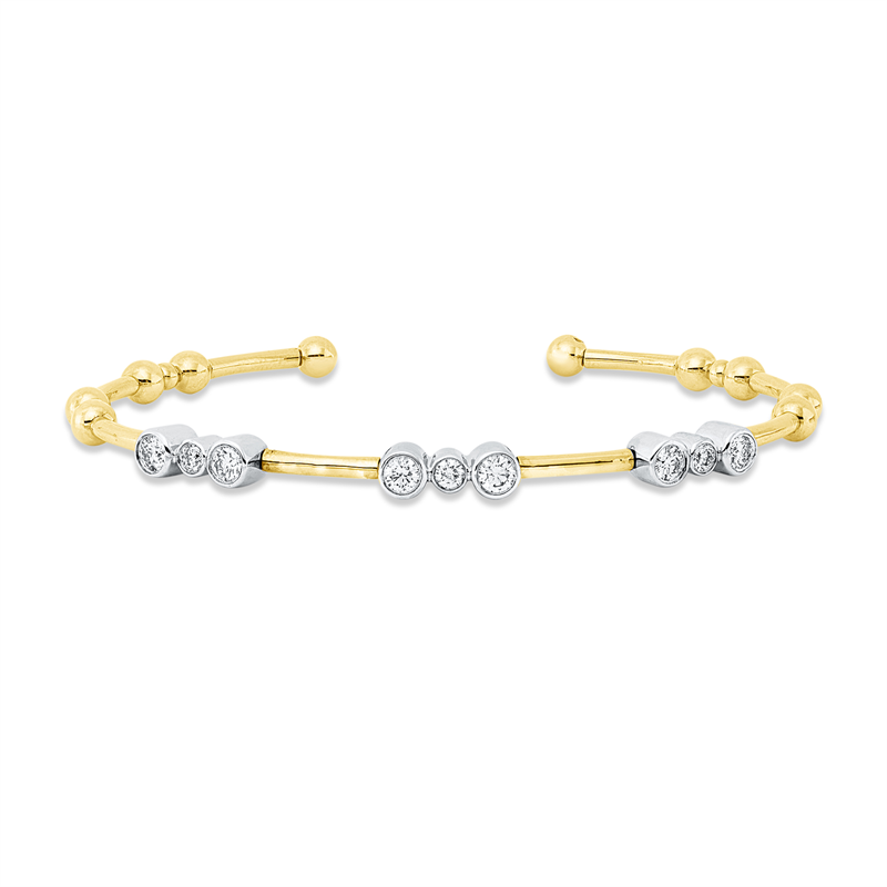 Armreif 14 kt GG+WG, 3 Brill. 0,14 ct, TW-si, 6 Brill. 0,49 ct, TW-si