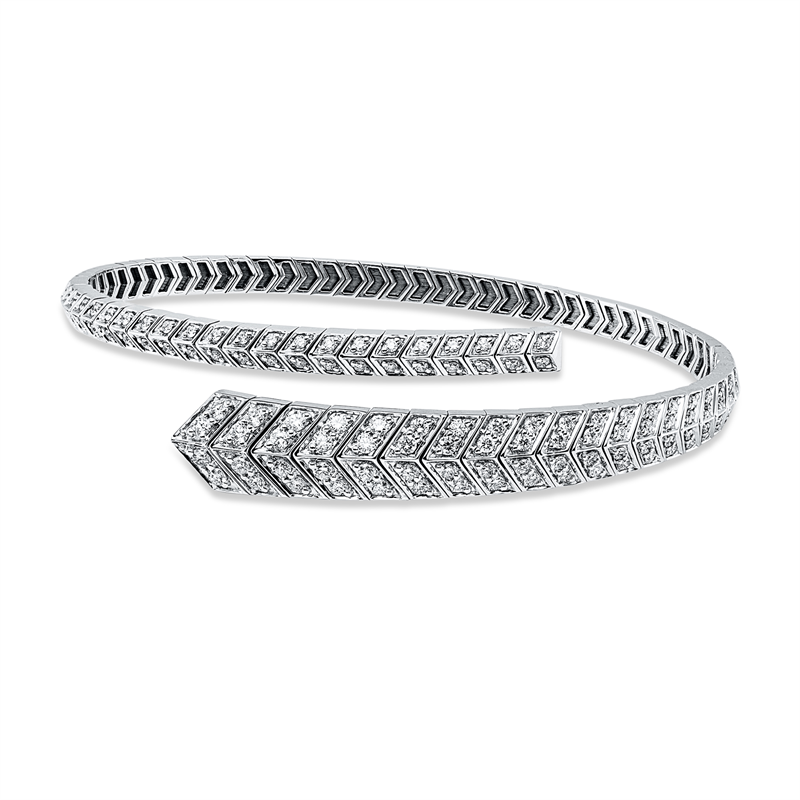 Armreif 18 kt WG, 44 Brill. 0,67 ct, TW-si, 4 Brill. 0,10 ct, TW-si, 74 Brill. 0,41 ct, TW-si