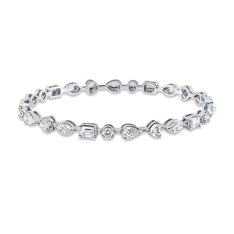 Armreif 18 kt WG, 2 Tropfen 0,45 ct, TW-vsi, 3 Nav. 0,56 ct, TW-vsi, 2 Herzschl. 0,39 ct, TW-vsi, 2 Sm.schliff 0,50 ct, TW-vsi, 3 Brill. 0,32 ct, TW-vsi