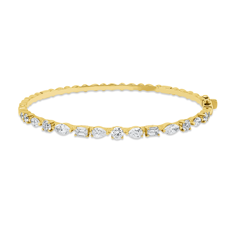 Armreif 18 kt GG, 2 Tropfen 0,38 ct, 4 Nav. 0,71 ct, 2 Sm.schliff 0,36 ct, 7 Brill. 0,82 ct, E-vsi/si