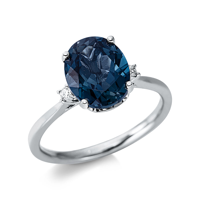 Ring 18 kt WG, 2 Brill. 0,04 ct, TW-si, 1 Topas 3,29 ct Lond. blue