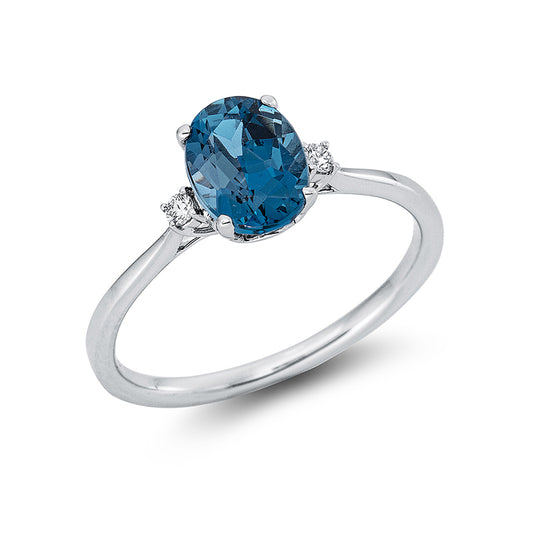 Ring 18 kt WG, 2 Brill. 0,04 ct, TW-si, 1 Topas 1,56 ct Lond. blue