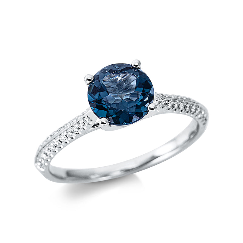 Ring 18 kt WG, 44 Brill. 0,14 ct, TW-si, 1 Topas 1,58 ct Lond. blue