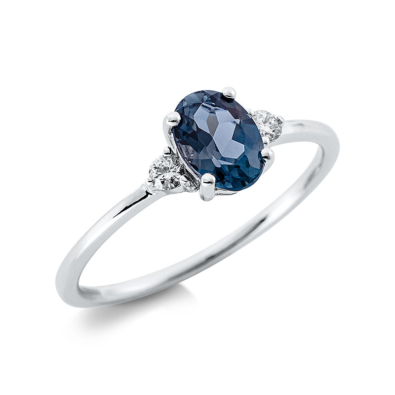 Ring 18 kt WG, 2 Brill. 0,08 ct, TW-si, 1 Topas 0,90 ct Lond. blue