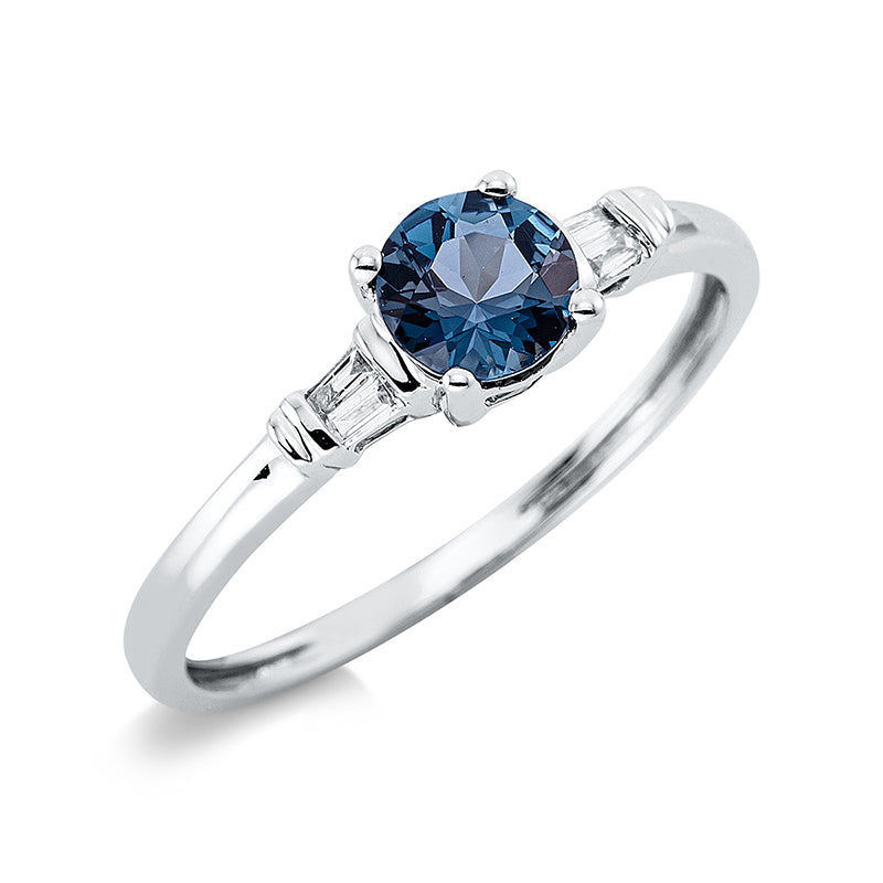 Ring 18 kt WG, 4 Bag. 0,04 ct, TW-si, 1 Topas 0,61 ct Lond. blue