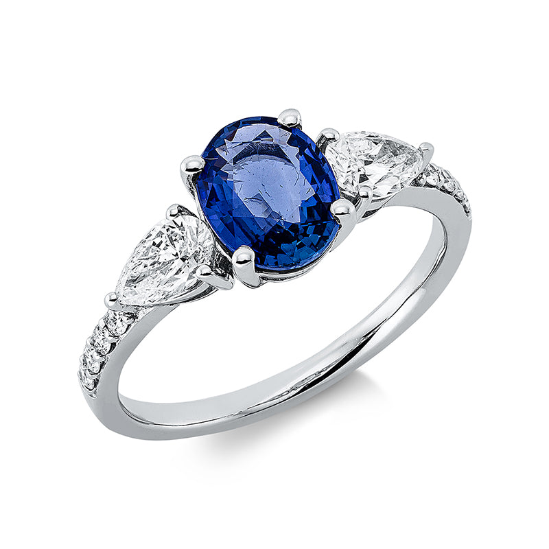 Ring 18 kt WG, 2 Tropfen 0,55 ct, TW-si, 8 Brill. 0,10 ct, TW-pi, 1 Saphir 1,42 ct blau