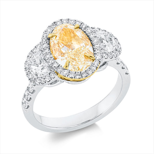 Ring 18 kt WG+GG, GIA5463033659, 1 Oval 3,01 ct, gelb-vsi, 2 Halbmond 0,66 ct, 30 Brill. 0,15 ct, 30 Brill. 0,39 ct