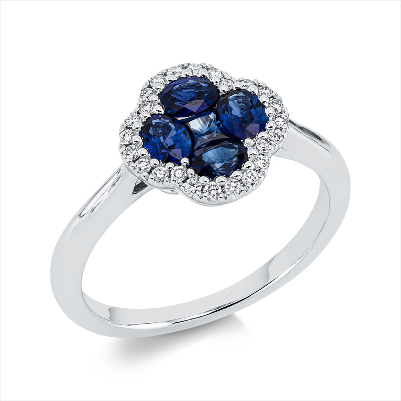 Ring 18 kt WG, 24 Brill. 0,13 ct, TW-si, 1 Saphir 0,12 ct blau, 4 Saphire 0,81 ct blau