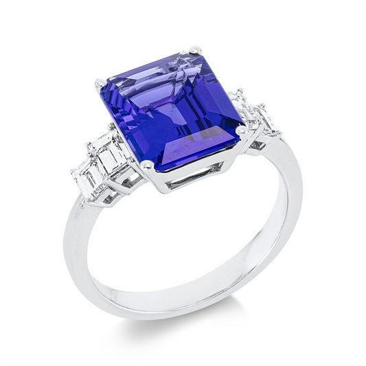 Ring 18 kt WG, 4 Bag. 0,59 ct, TW-si, 1 Tansanit 4,93 ct blau