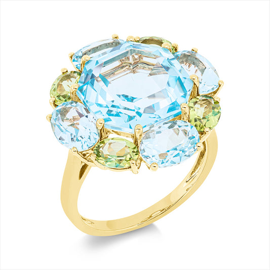 Ring 18 kt GG, 4 Topase 3,80 ct sky blue, 1 Topas 9,80 ct sky blue, 4 Peridot 1,60 ct grün