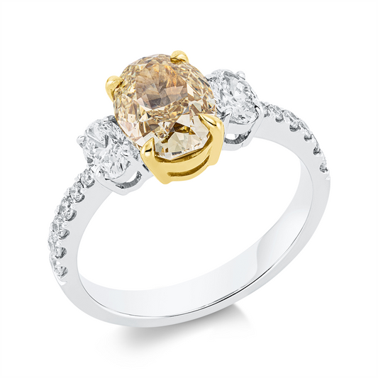 Ring 18 kt WG+GG, GIA6415217592, 2 Oval 0,47 ct, TW-si, 1 Oval 2,09 ct, gelb-si, 12 Brill. 0,23 ct, TW-si