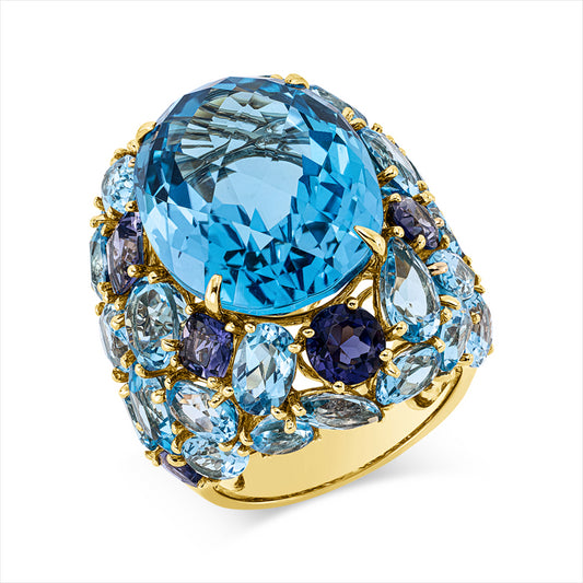 Ring 18 kt GG, 28 Topase 19,30 ct blau, 1 Topas 24,20 ct blau, 8 Iolith 3,30 ct lila