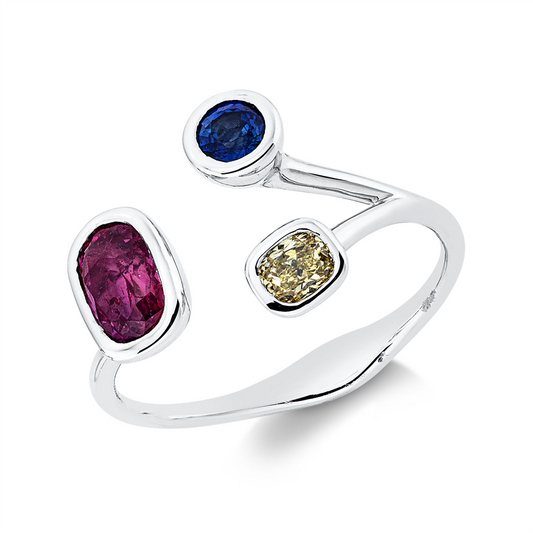Ring 18 kt WG, 1 Brill. 0,18 ct, gelb, 1 Rubin 0,23 ct rot, 1 Saphir 0,84 ct blau