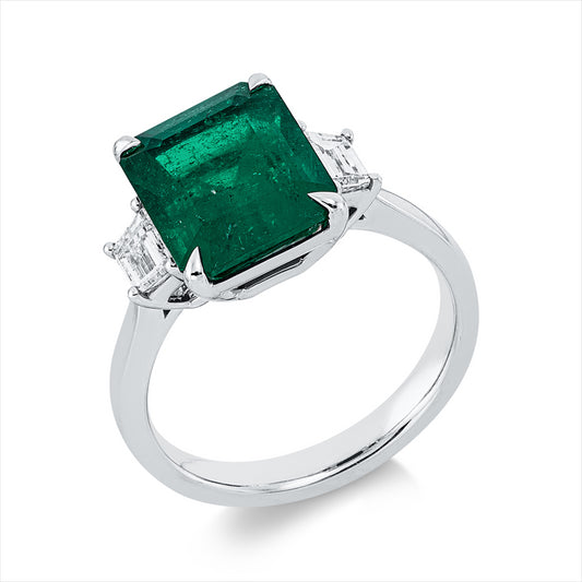 Ring 18 kt WG, 2 Trap. 0,46 ct, F-vvs/vs, 1 Smaragd 4,01 ct grün